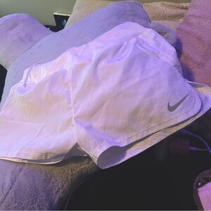 White Nike shorts